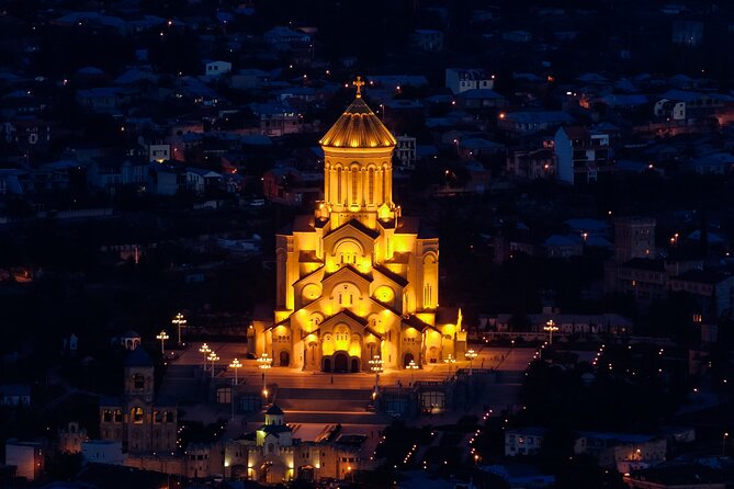 Explore Tbilisi Full Day Tour ( 3KM stroll rest by the car) - Medieval walls, a playful clock, and ancient churches