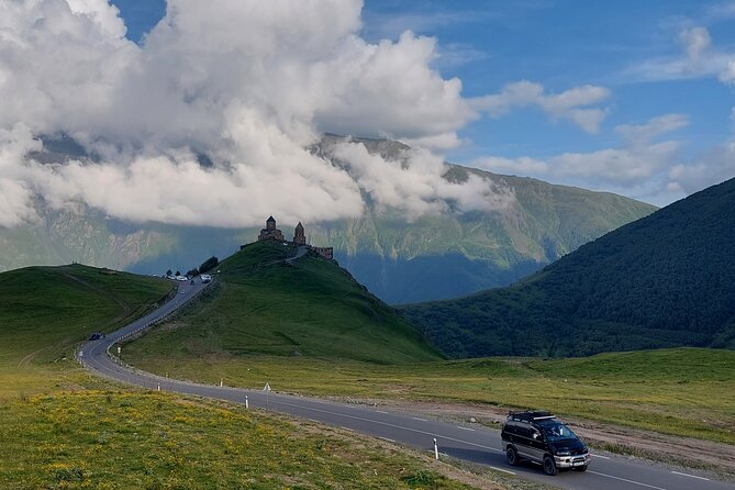 From Tbilisi: Kazbegi Ananuri Gudauri and Trusso Valley by 4x4 - Stepantsminda and the View of Gergeti Trinity Church