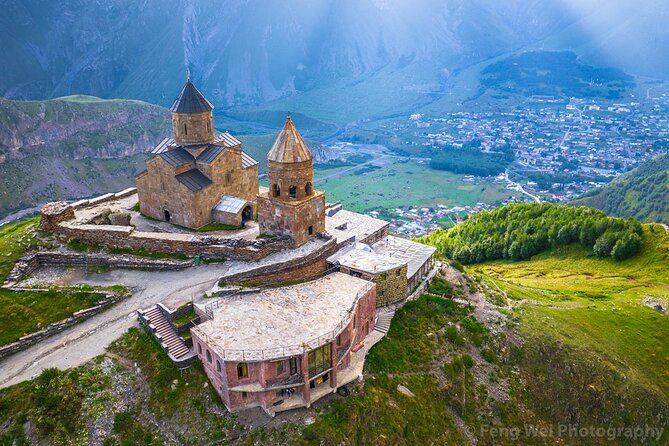 Full Day Kazbegi Guided Tour in Georgia - Stepantsminda and views toward Mount Kazbeg