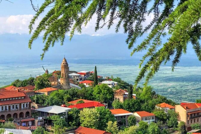 One Day Kakheti Tour with Wine Tasting and Free Churchkhela - Badiauri brings bread straight from the oven