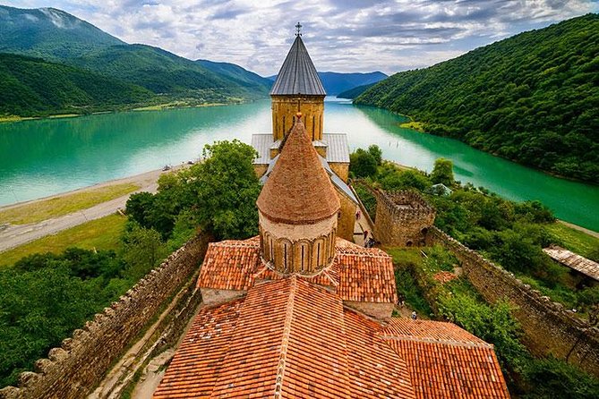 One day trip to highest mountains Kazbegi from Tbilisi - Ananuri Fortress begins the historical story