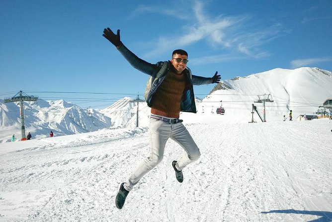 Private Full Day Tour In Kazbegi - Gudauri (Paragliding & Rafting) - Stepantsminda and lunch with a mountain view