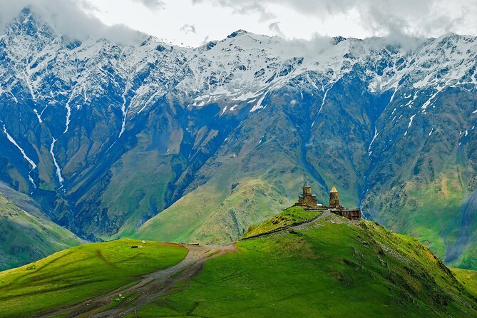 Tbilisi to Kazbegi, Gudauri, and Ananuri Day Tour - Gergeti Trinity Church is the grand finale